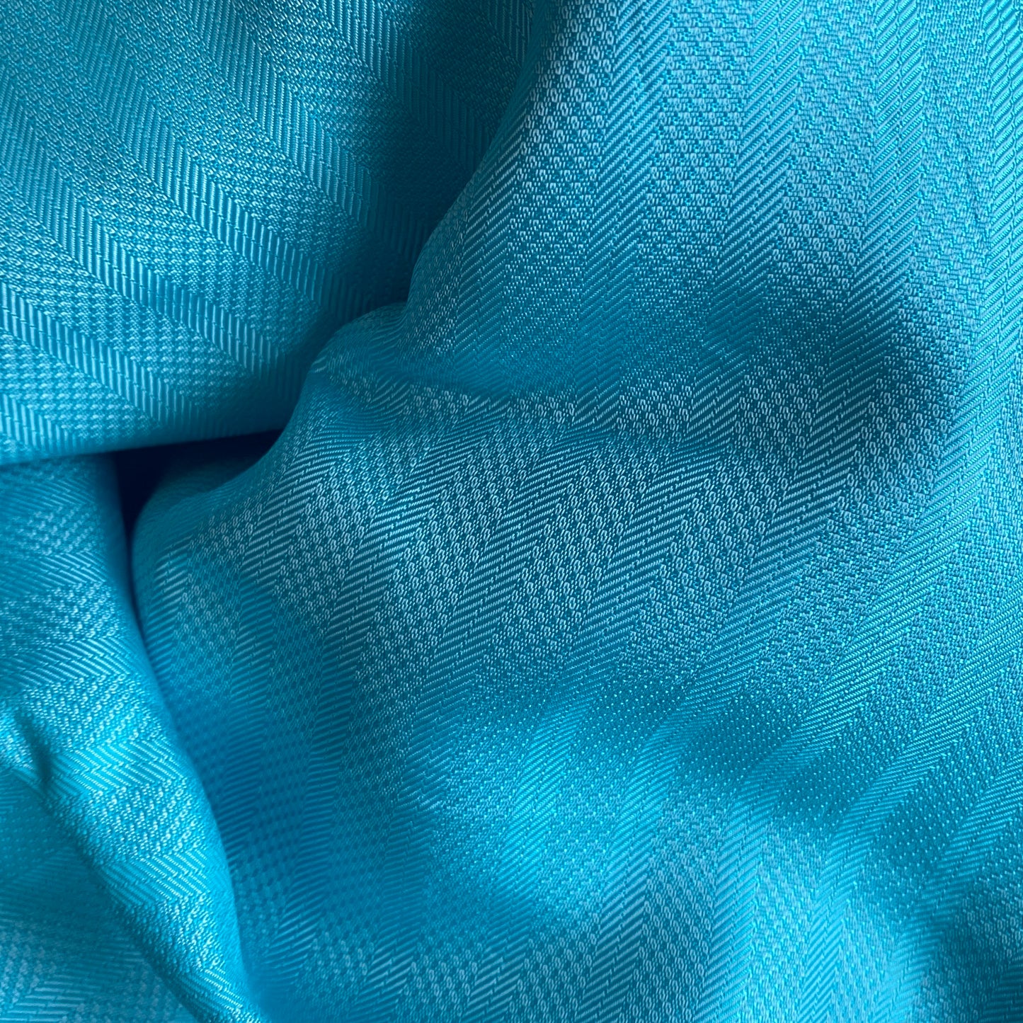 Palazzo trousers by COLUCCI, inspired by 1930s beach pyjamas, featuring a wide draping leg, high-waisted flat-front silhouette, and discreet side elastic waistband for comfort. Available in three eye-catching colours, crafted from designer deadstock fabrics for day-to-night elegance.