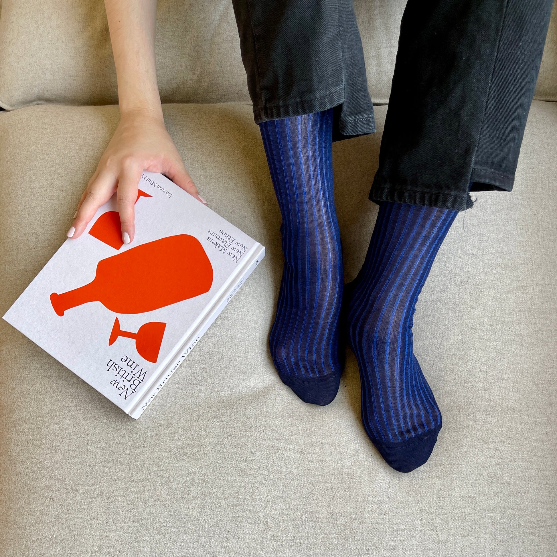 Italian-made navy mid-calf dress socks with a subtle blue shadow rib, crafted from 100% pure cotton for exceptional comfort and a refined aesthetic. The deep navy hue and tonal blue ribbing add sophistication, perfect for both everyday wear and polished occasions.