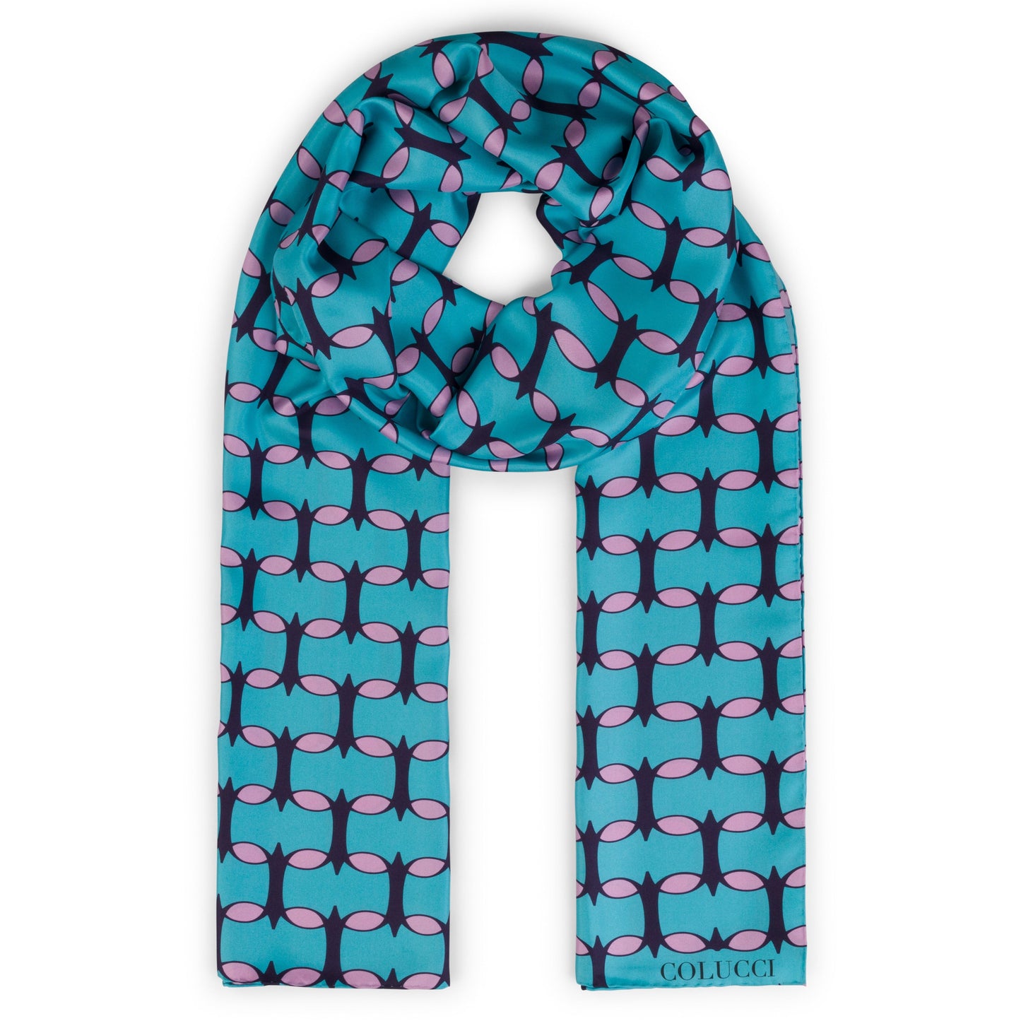Teal and pink monogram silk shawl by COLUCCI, hand-rolled and printed in Macclesfield. This extra-long, limited-edition shawl offers versatile styling and a touch of drama, reflecting a commitment to sustainable fashion with minimized overproduction.