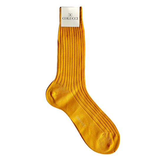 Italian-made bright yellow mid-calf length socks by COLUCCI, crafted from 100% pure cotton for unparalleled comfort. The striking pop of colour and mid-calf length blend contemporary flair with classic appeal, making them a versatile addition to any outfit.